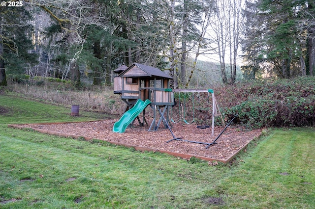 view of jungle gym featuring a lawn