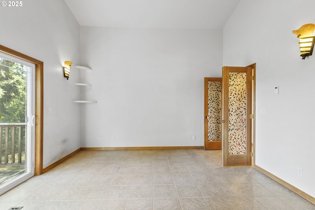 empty room with light tile patterned flooring