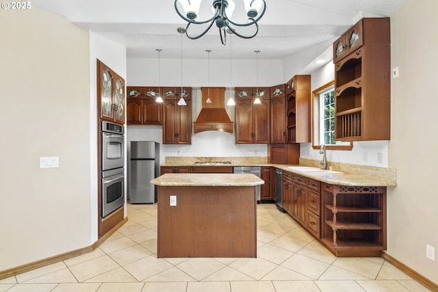 kitchen featuring sink, stainless steel appliances, custom exhaust hood, a kitchen island, and pendant lighting