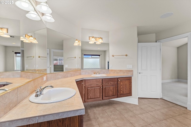 11168 SW Brown St, Tualatin, OR 97062 - full bath featuring vanity, tile patterned floors, a closet, and baseboards