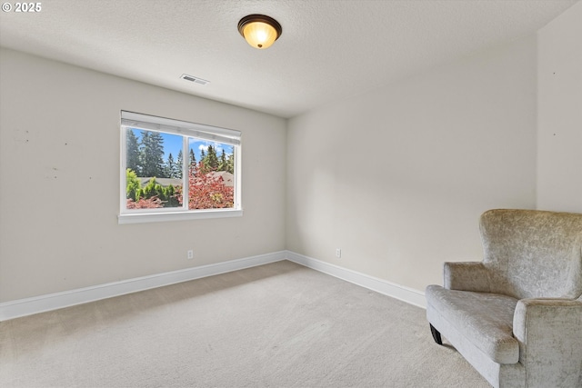 11168 SW Brown St, Tualatin, OR 97062 - unfurnished room featuring light carpet, baseboards, and a textured ceiling