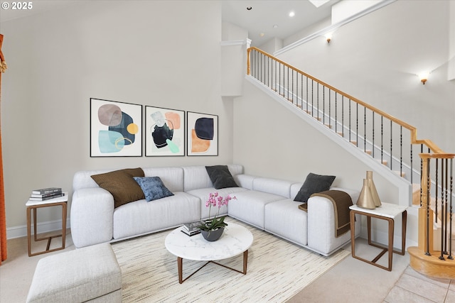 11168 SW Brown St, Tualatin, OR 97062 - living area with stairway, a high ceiling, and recessed lighting