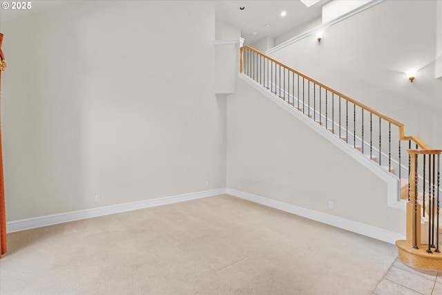 11168 SW Brown St, Tualatin, OR 97062 - stairs featuring carpet, baseboards, and recessed lighting