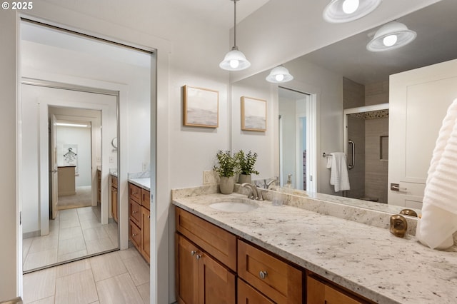 bathroom featuring vanity and walk in shower