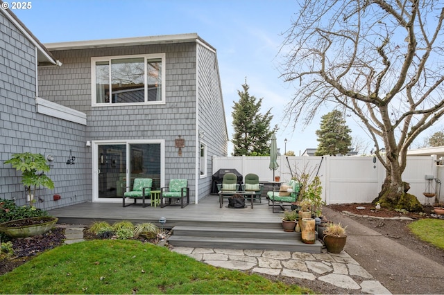 back of house featuring an outdoor hangout area and a deck