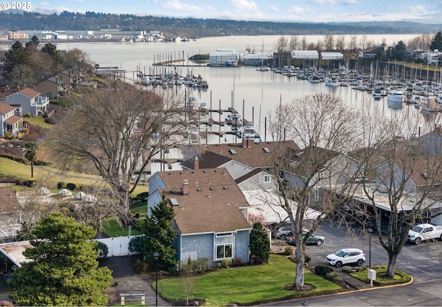 bird's eye view with a water view