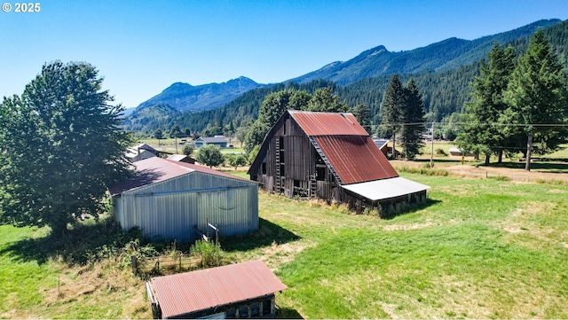 view of mountain feature with a rural view