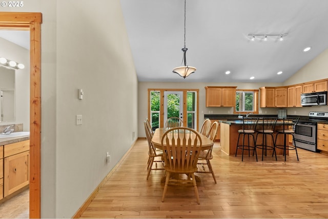 1430 N Cedar Creek Cir, Rockaway Beach, OR 97136 - dining area featuring lofted ceiling, light wood-style floors, and recessed lighting