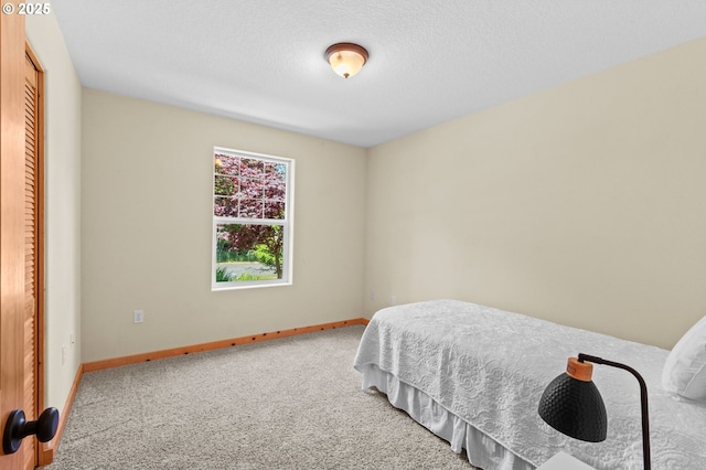 1430 N Cedar Creek Cir, Rockaway Beach, OR 97136 - bedroom featuring baseboards and carpet floors