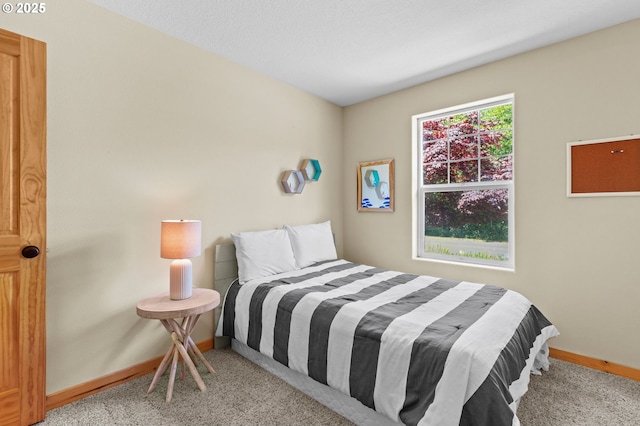 1430 N Cedar Creek Cir, Rockaway Beach, OR 97136 - carpeted bedroom featuring baseboards