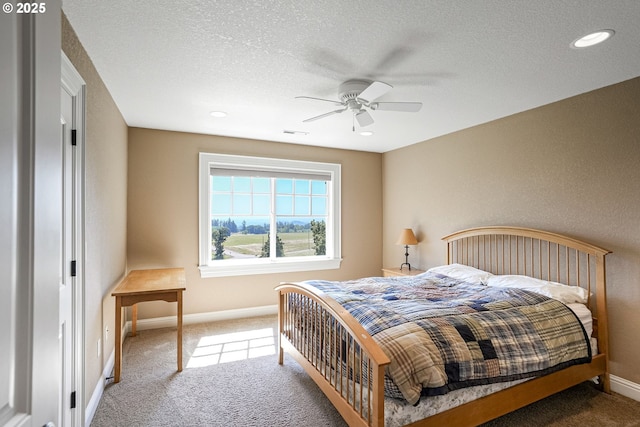 3545 Eagle Crest Rd NW, Salem, OR 97304 - carpeted bedroom with a textured ceiling, ceiling fan, and recessed lighting