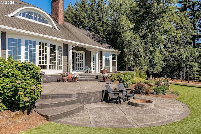 3545 Eagle Crest Rd NW, Salem, OR 97304 - view of patio with a fire pit and french doors