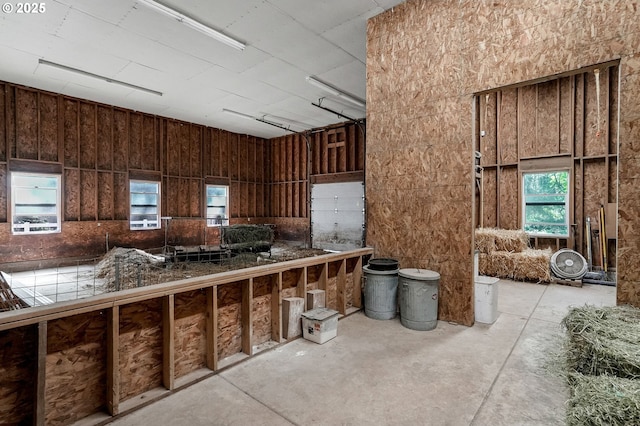 3545 Eagle Crest Rd NW, Salem, OR 97304 - kitchen featuring healthy amount of natural light, tile counters, dark brown cabinetry, and concrete flooring