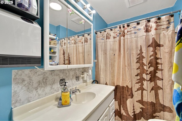 1224 Coal Creek Rd, Longview, WA 98632 - bathroom featuring vanity and decorative backsplash