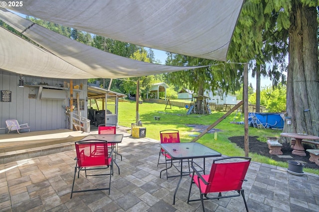 1224 Coal Creek Rd, Longview, WA 98632 - view of patio / terrace featuring a playground and outdoor dining space