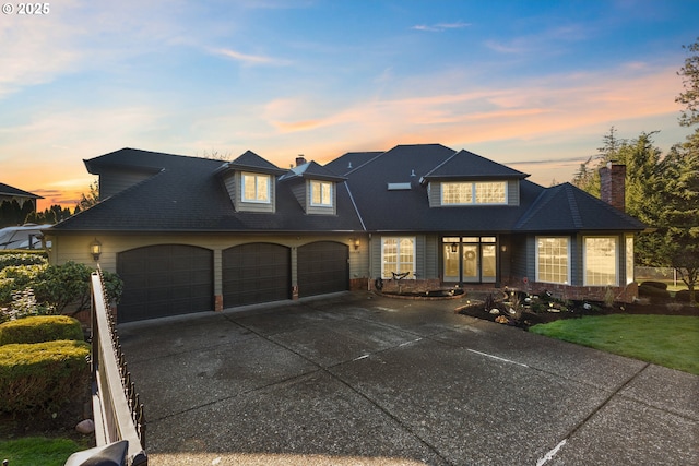 view of front of home with a garage