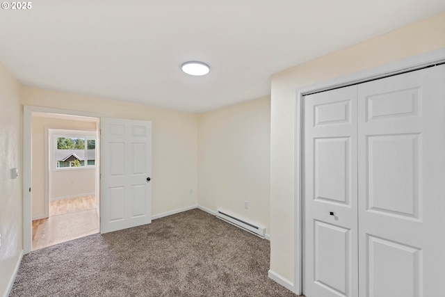 1751 S 19th St, Coos Bay, OR 97420 - unfurnished bedroom with carpet, a closet, baseboards, and baseboard heating