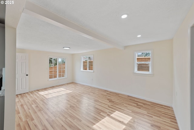 1751 S 19th St, Coos Bay, OR 97420 - unfurnished room featuring light wood-style floors, baseboards, beam ceiling, and recessed lighting