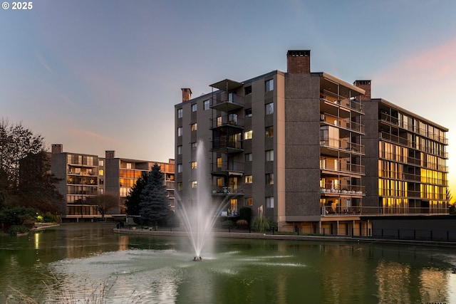 outdoor building at dusk with a water view