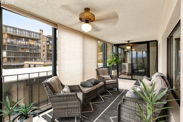 balcony featuring cooling unit and ceiling fan