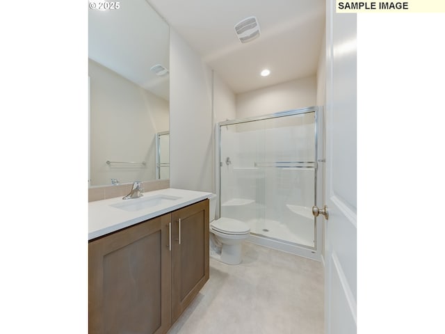 full bathroom featuring toilet, recessed lighting, vanity, visible vents, and a stall shower