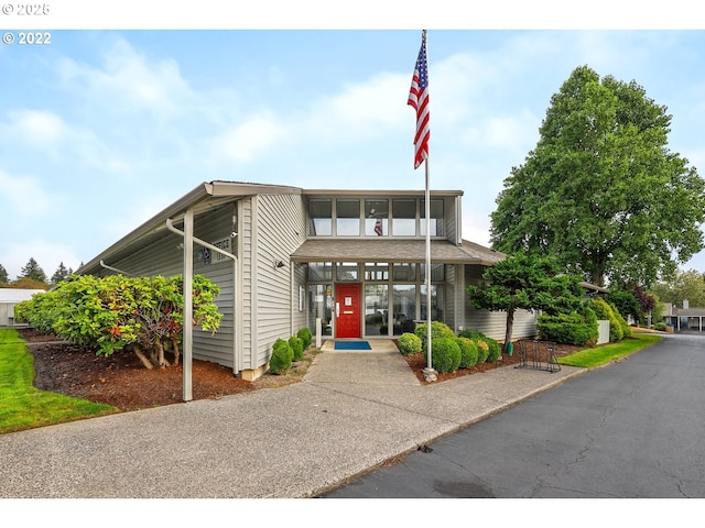view of property with driveway