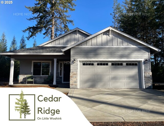 craftsman inspired home featuring a garage and a porch