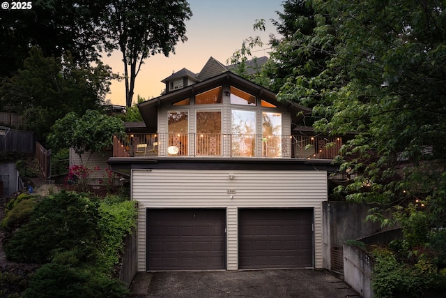2345 NE Ridgewood Dr, Portland, OR 97212 - garage at dusk with driveway
