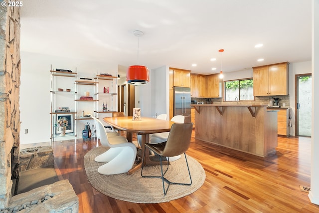2345 NE Ridgewood Dr, Portland, OR 97212 - dining space with light wood finished floors and recessed lighting