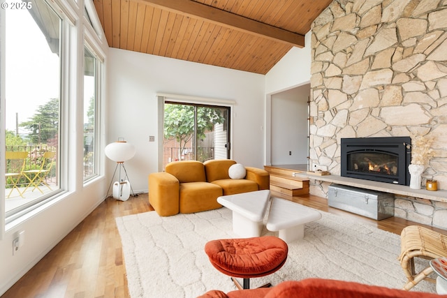 2345 NE Ridgewood Dr, Portland, OR 97212 - living area featuring wooden ceiling, light wood-style flooring, and a stone fireplace