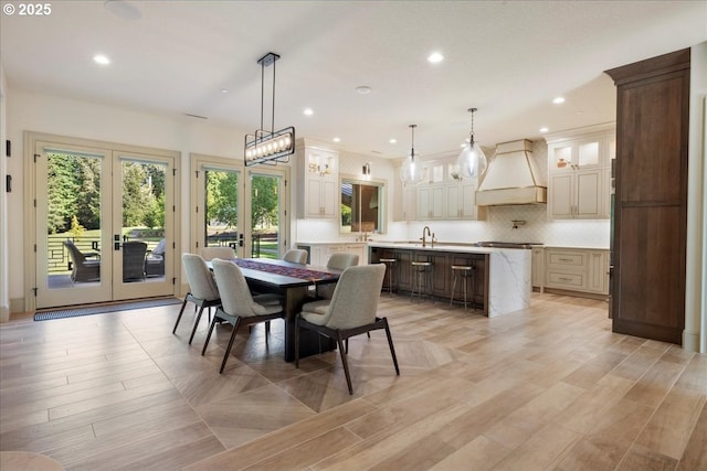 25003 NW 4th Ct, Ridgefield, WA 98642 - dining room with french doors, recessed lighting, and light wood-type flooring