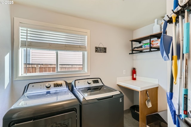 laundry area featuring laundry area and washing machine and clothes dryer