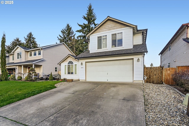 traditional-style house with driveway, a garage, roof with shingles, fence, and a front lawn