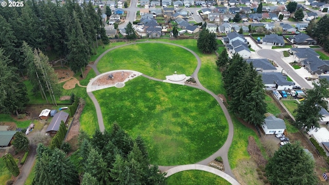 birds eye view of property with a residential view