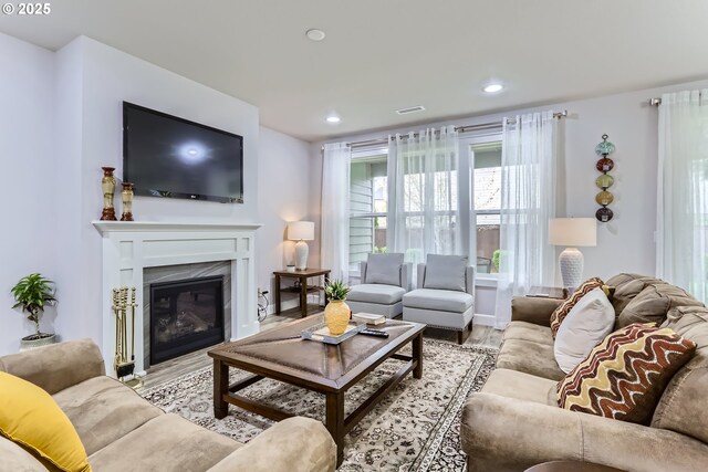 12024 NE 109th St, Vancouver, WA 98662 - living room featuring recessed lighting, a high end fireplace, and wood finished floors