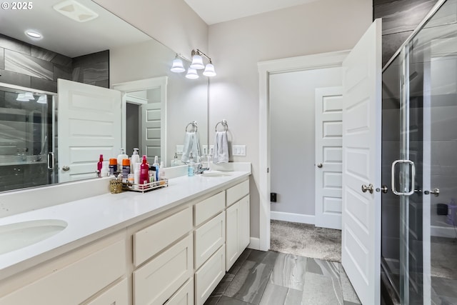 12024 NE 109th St, Vancouver, WA 98662 - full bath featuring a shower stall, double vanity, a sink, and baseboards