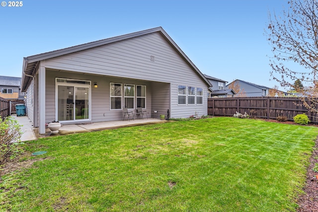 12024 NE 109th St, Vancouver, WA 98662 - rear view of house with a patio area, a fenced backyard, and a lawn