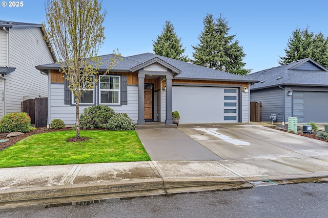 12024 NE 109th St, Vancouver, WA 98662 - view of front of house with roof with shingles, fence, a front lawn, a garage, and driveway
