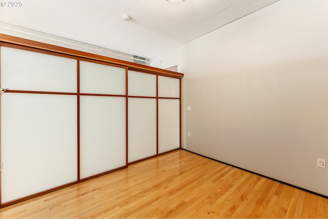 333 NW 9th Ave Unit 902, Portland, OR 97209 - unfurnished bedroom with light wood-type flooring