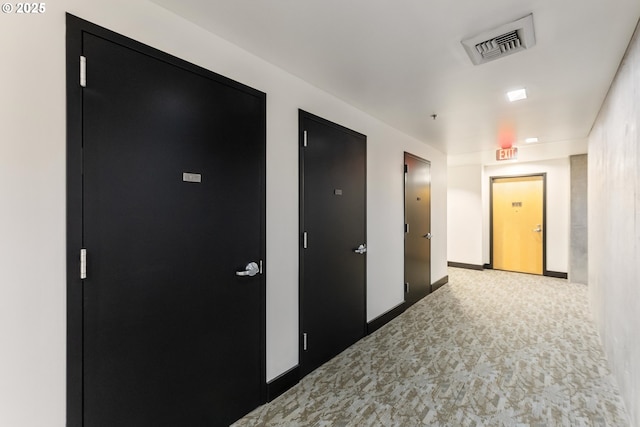 333 NW 9th Ave Unit 902, Portland, OR 97209 - hallway featuring carpet flooring and baseboards