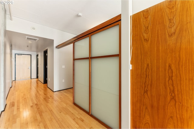 333 NW 9th Ave Unit 902, Portland, OR 97209 - hallway with light wood finished floors
