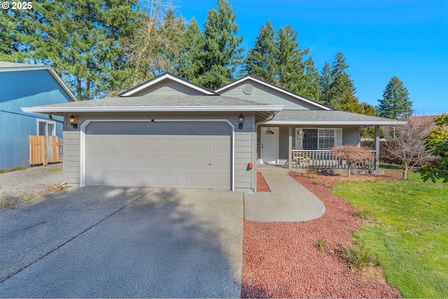 single story home featuring a porch, an attached garage, fence, driveway, and roof with shingles