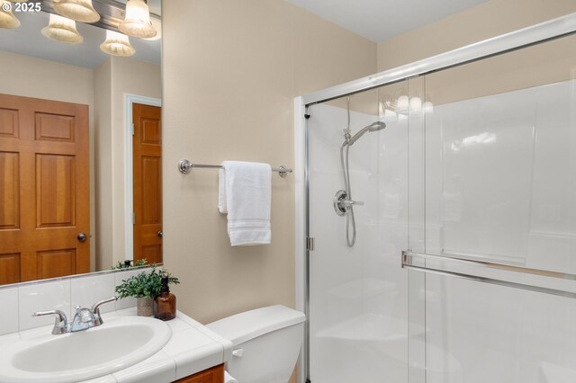 4873 NW Promenade Ter Unit 122, Portland, OR 97229 - bathroom featuring vanity and a shower stall