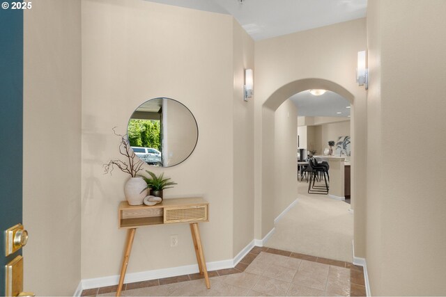 4873 NW Promenade Ter Unit 122, Portland, OR 97229 - hall with arched walkways and carpet