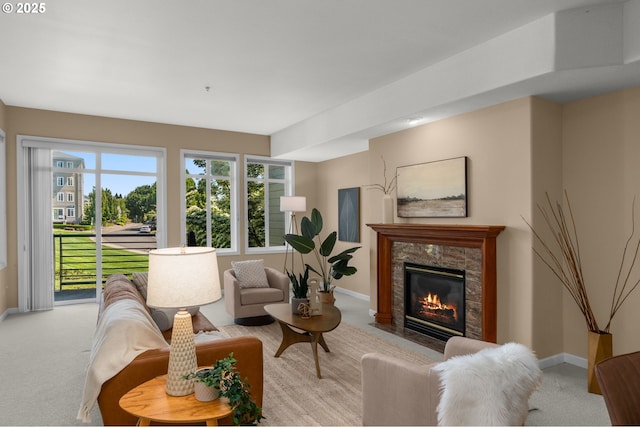 4873 NW Promenade Ter Unit 122, Portland, OR 97229 - living room featuring light colored carpet and a fireplace