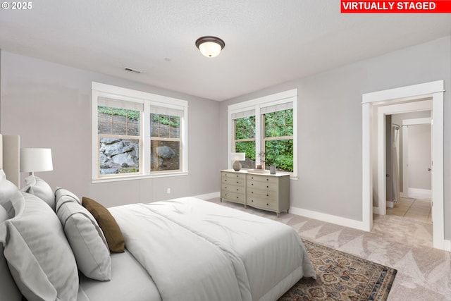 19375 SW Eastside Rd, Lake Oswego, OR 97034 - bedroom with baseboards and light colored carpet