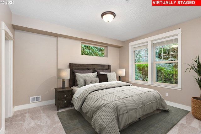 19375 SW Eastside Rd, Lake Oswego, OR 97034 - carpeted bedroom featuring baseboards and a textured ceiling