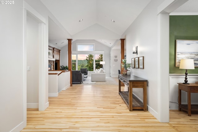 19375 SW Eastside Rd, Lake Oswego, OR 97034 - hallway with ornate columns, wood finished floors, and lofted ceiling