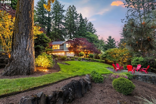 19375 SW Eastside Rd, Lake Oswego, OR 97034 - yard at dusk featuring a fire pit, a yard, and a patio area
