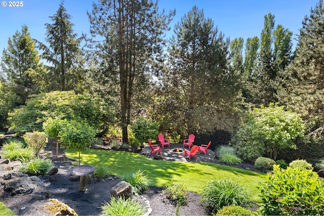 19375 SW Eastside Rd, Lake Oswego, OR 97034 - view of green lawn with a fire pit and a patio